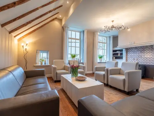Luxe vakantieverblijf met sauna, riante tuin en speelschuur