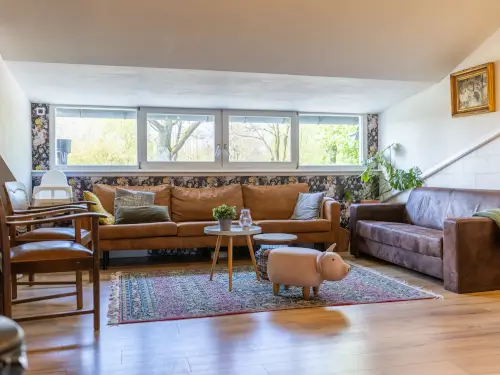 Vakantiehuis met luxe kamers op een educatieve boerderij