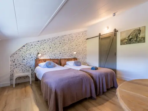 Vakantiehuis met luxe kamers op een educatieve boerderij