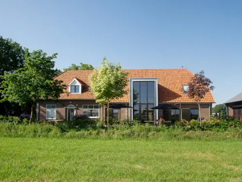 Luxe groepshuis op de Veluwe met zwemvijver & sauna