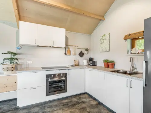 4 verwarmde huisjes met eigen veranda + gezamenlijke ruimte