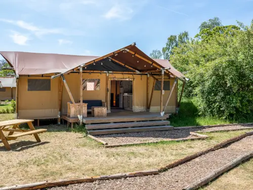 Groepsverblijf met 7 lodges met eigen veranda